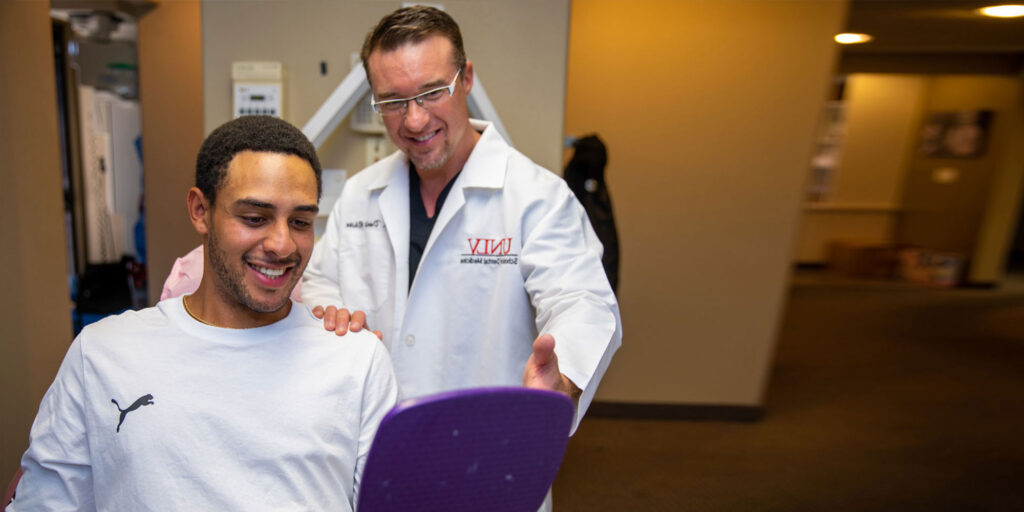 patient smiling confidently after their dental procedure