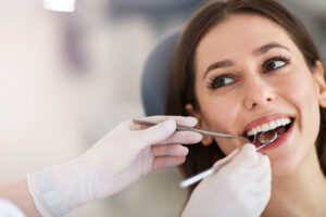 patient sitting at the dentist